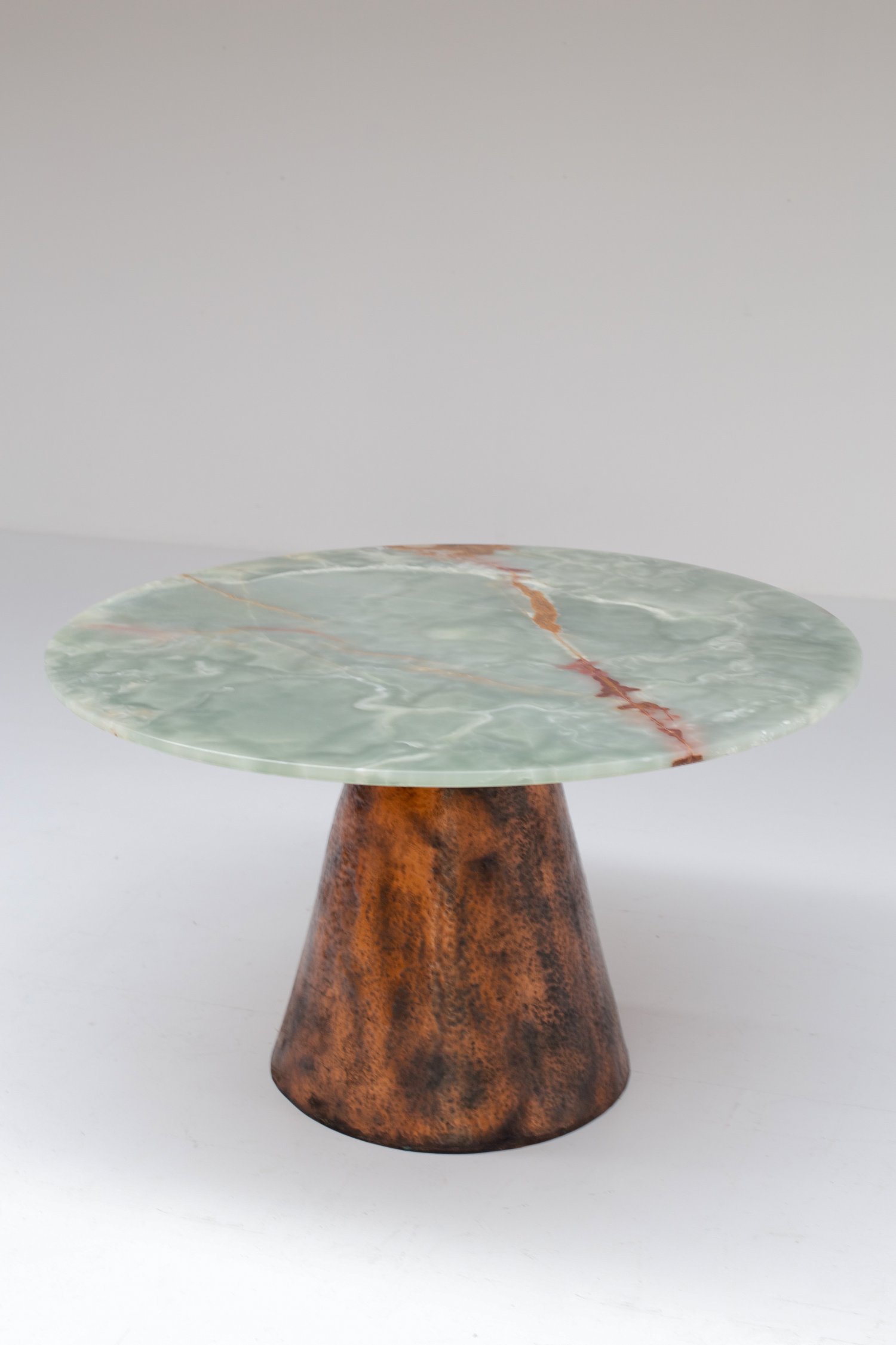 Copper and onyx dining table.