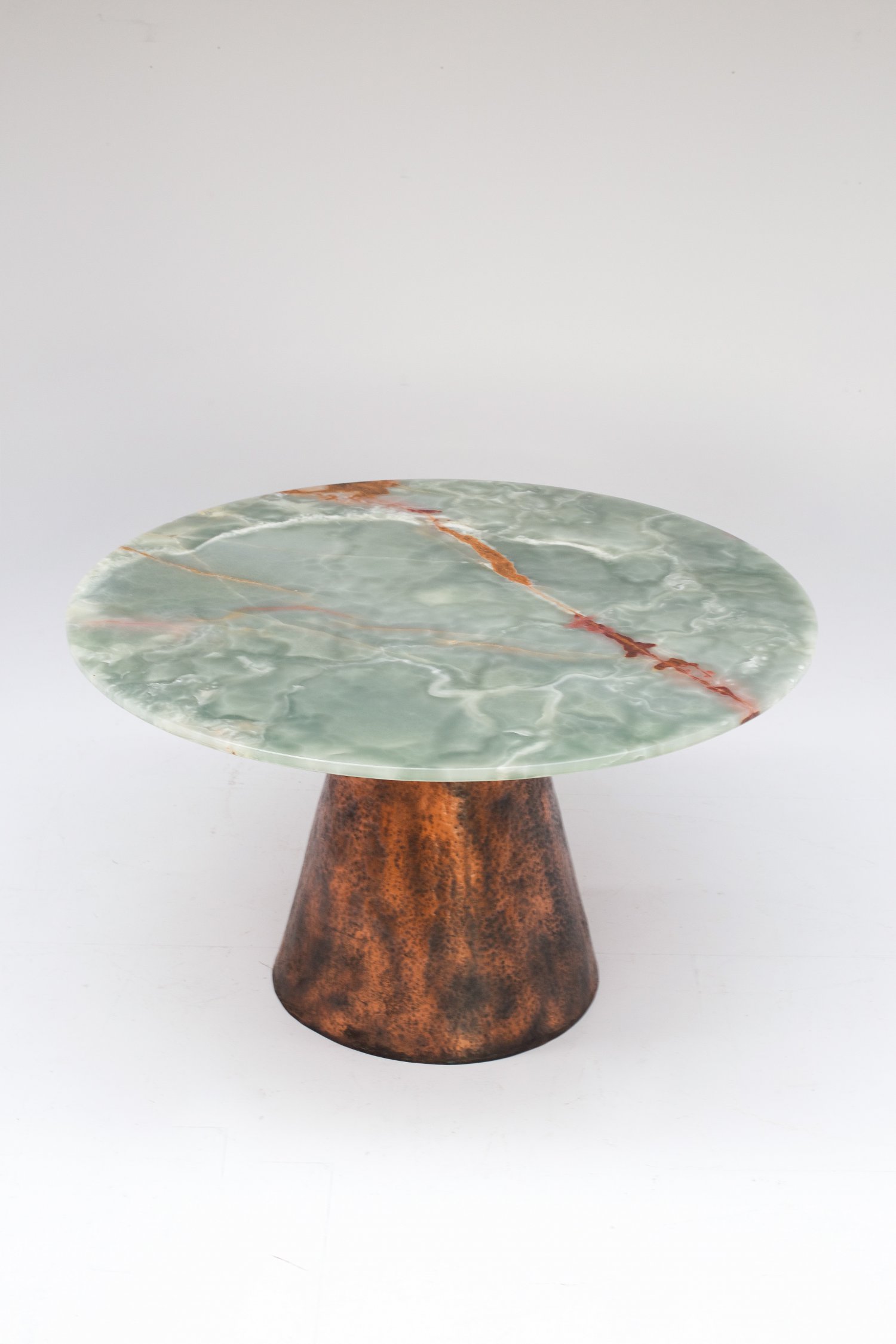 Copper and onyx dining table.