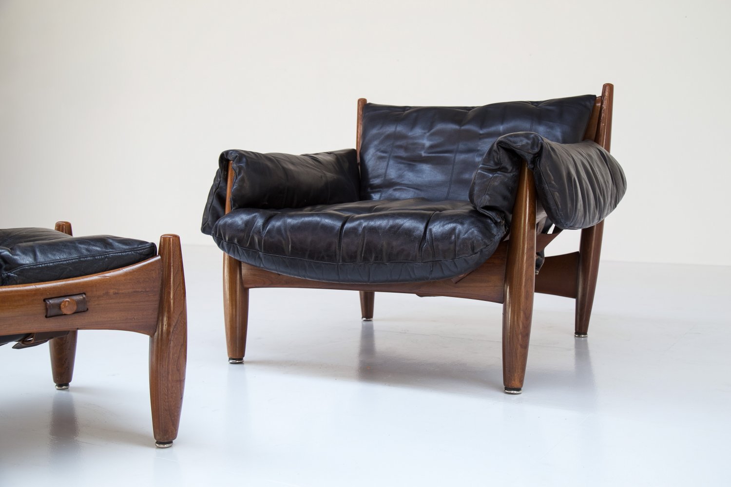 Sergio Rodrigues 'Sheriff' chair and ottoman.