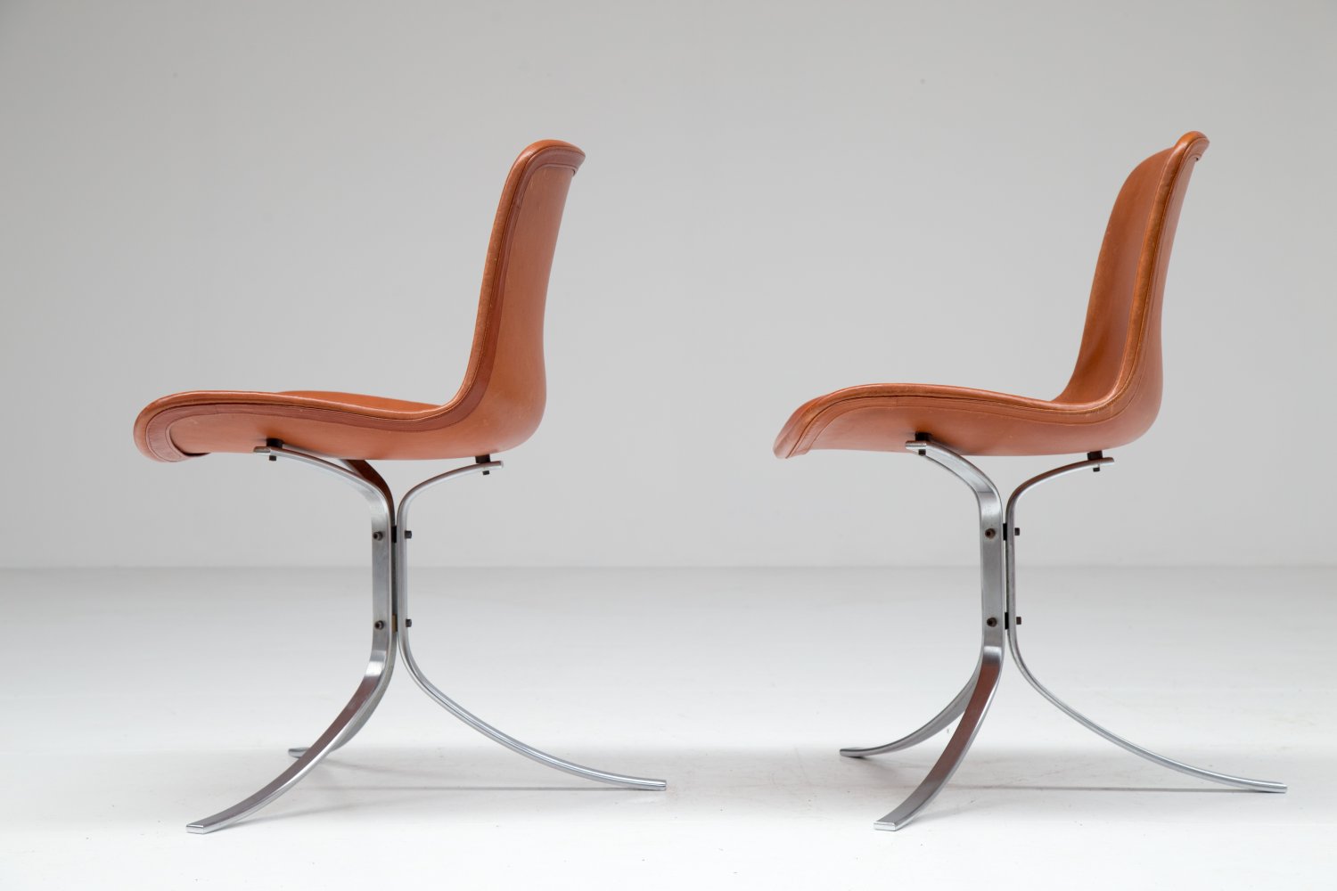 Pair of PK9 chairs by Poul Kjaerholm