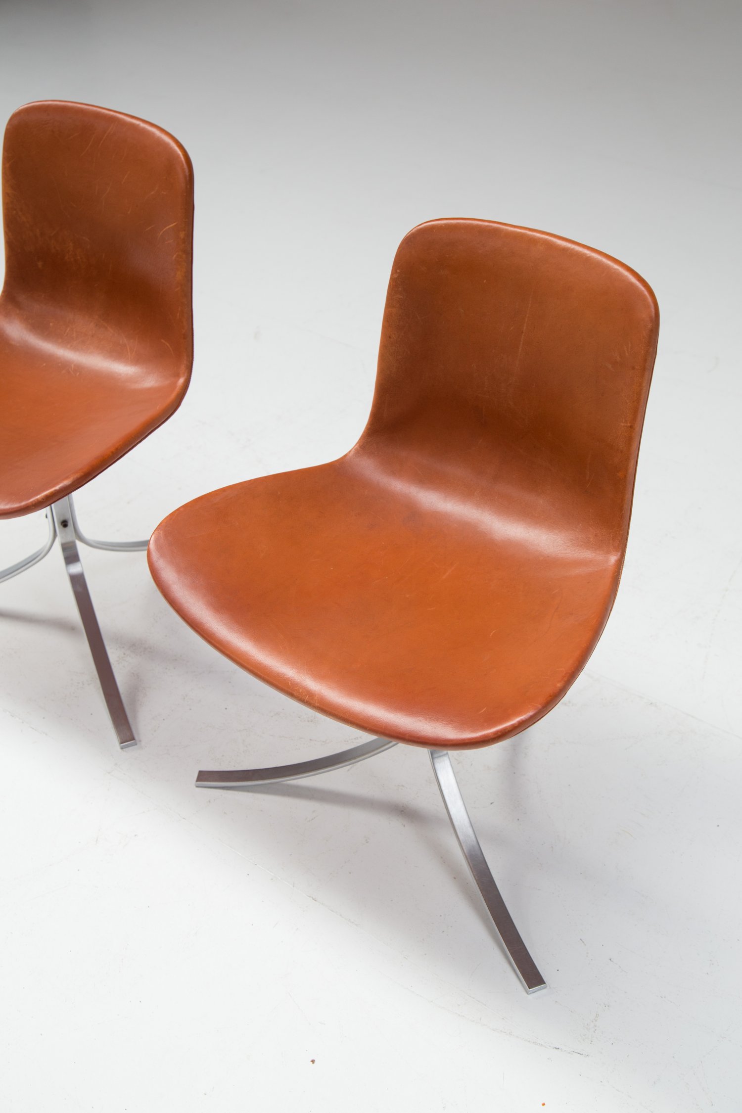 Pair of PK9 chairs by Poul Kjaerholm