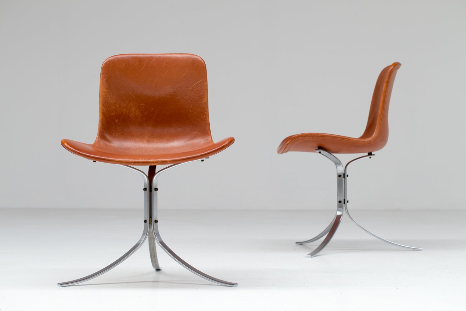 Pair of PK9 chairs by Poul Kjaerholm