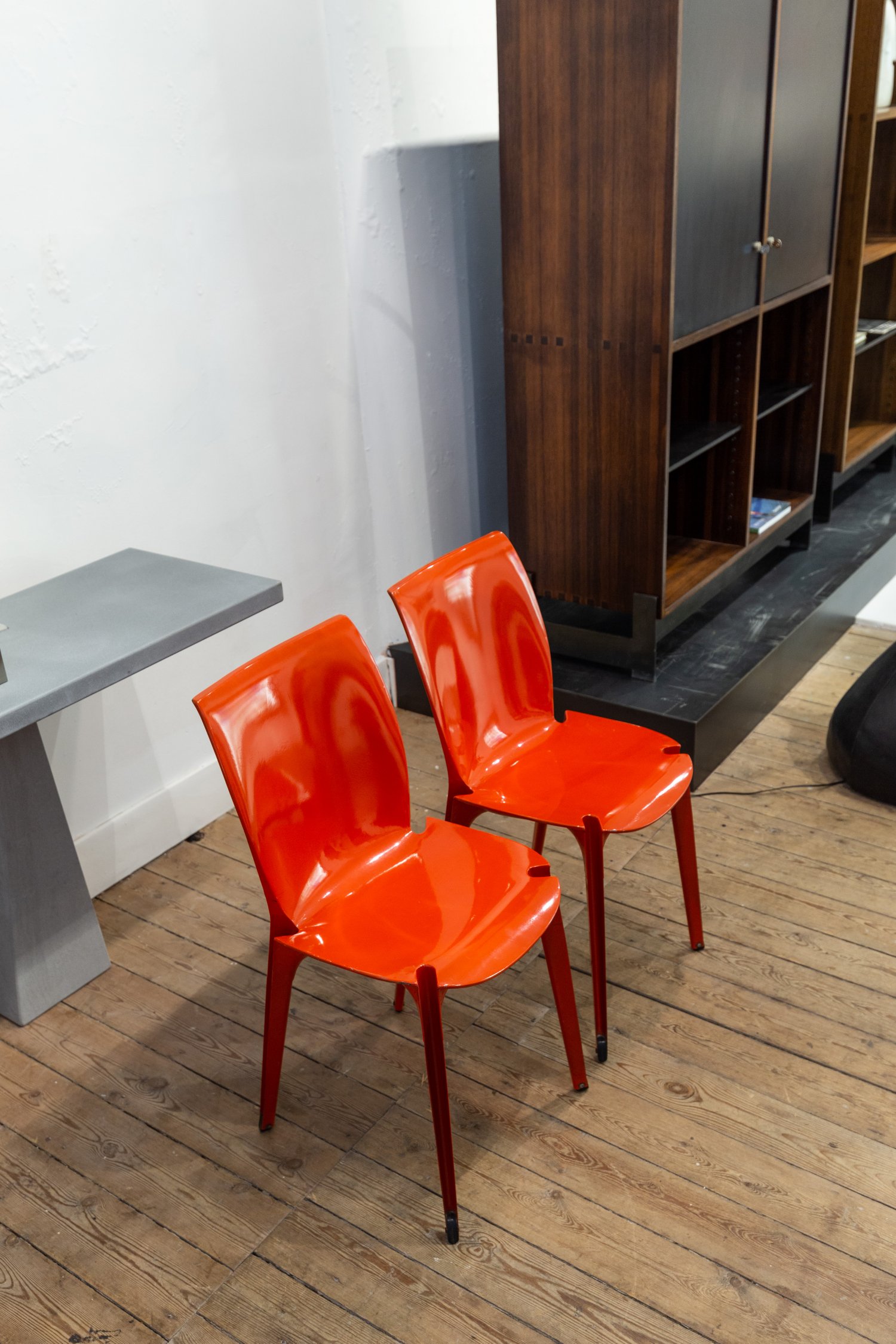 Pair of red 'Lambda' chairs by Marco Zanuso & Richard Sapper