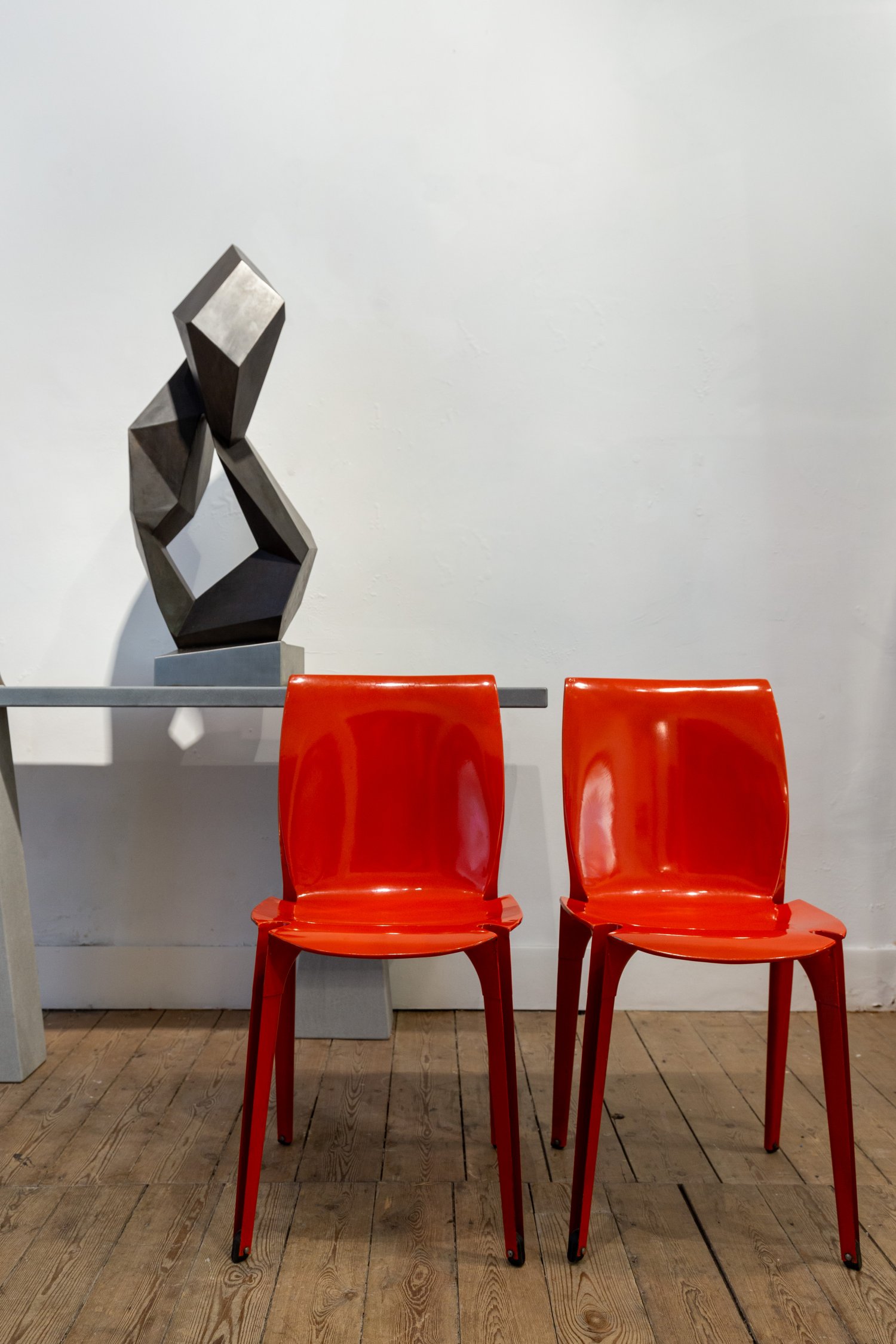 Pair of red 'Lambda' chairs by Marco Zanuso & Richard Sapper