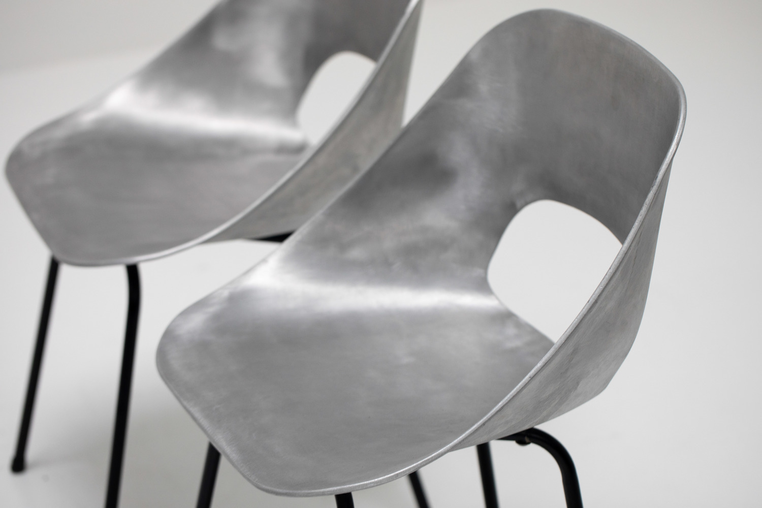 Aluminium chairs by Pierre Guariche 
