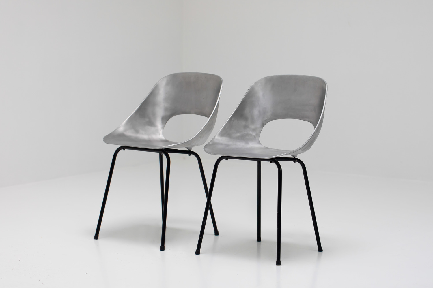 Aluminium chairs by Pierre Guariche 