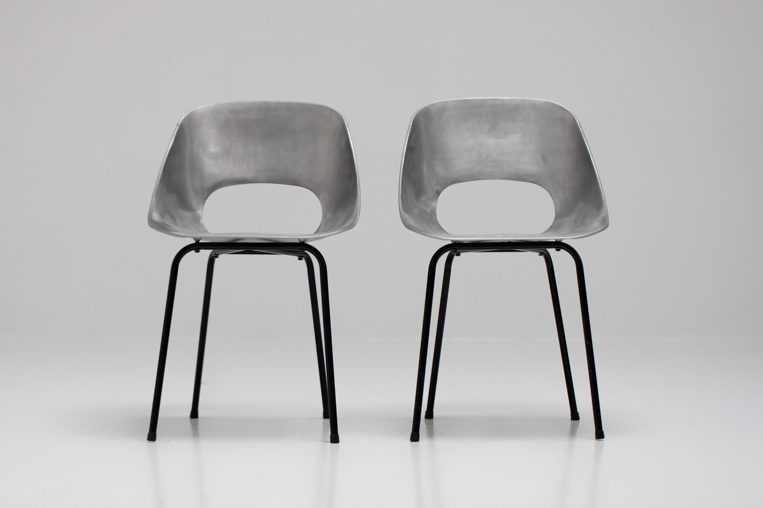 Aluminium chairs by Pierre Guariche 