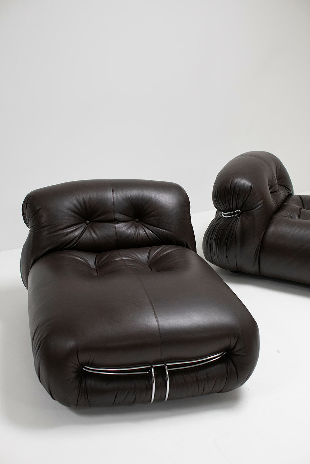 Pair of dark brown leather Soriano lounge chairs