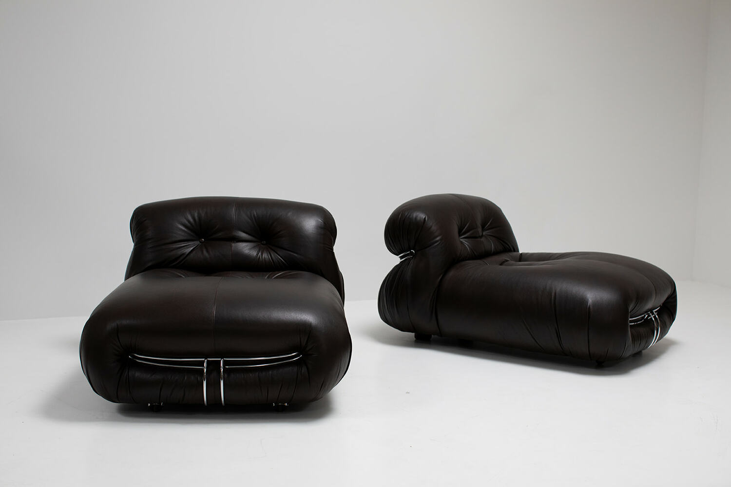 Pair of dark brown leather Soriano lounge chairs