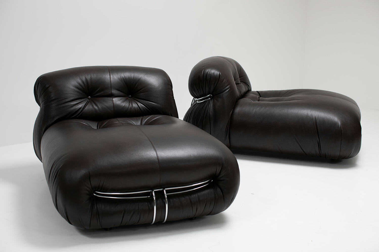 Pair of dark brown leather Soriano lounge chairs